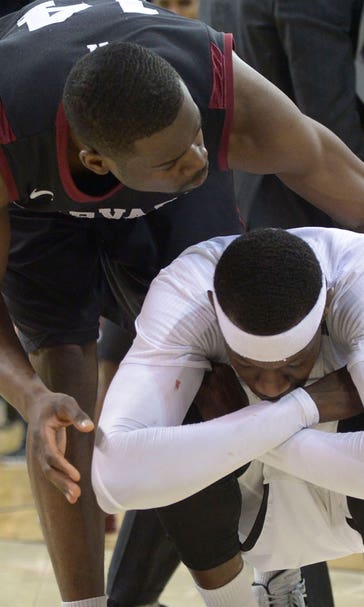 Harvard upsets 5th-seed Cincinnati 61-57